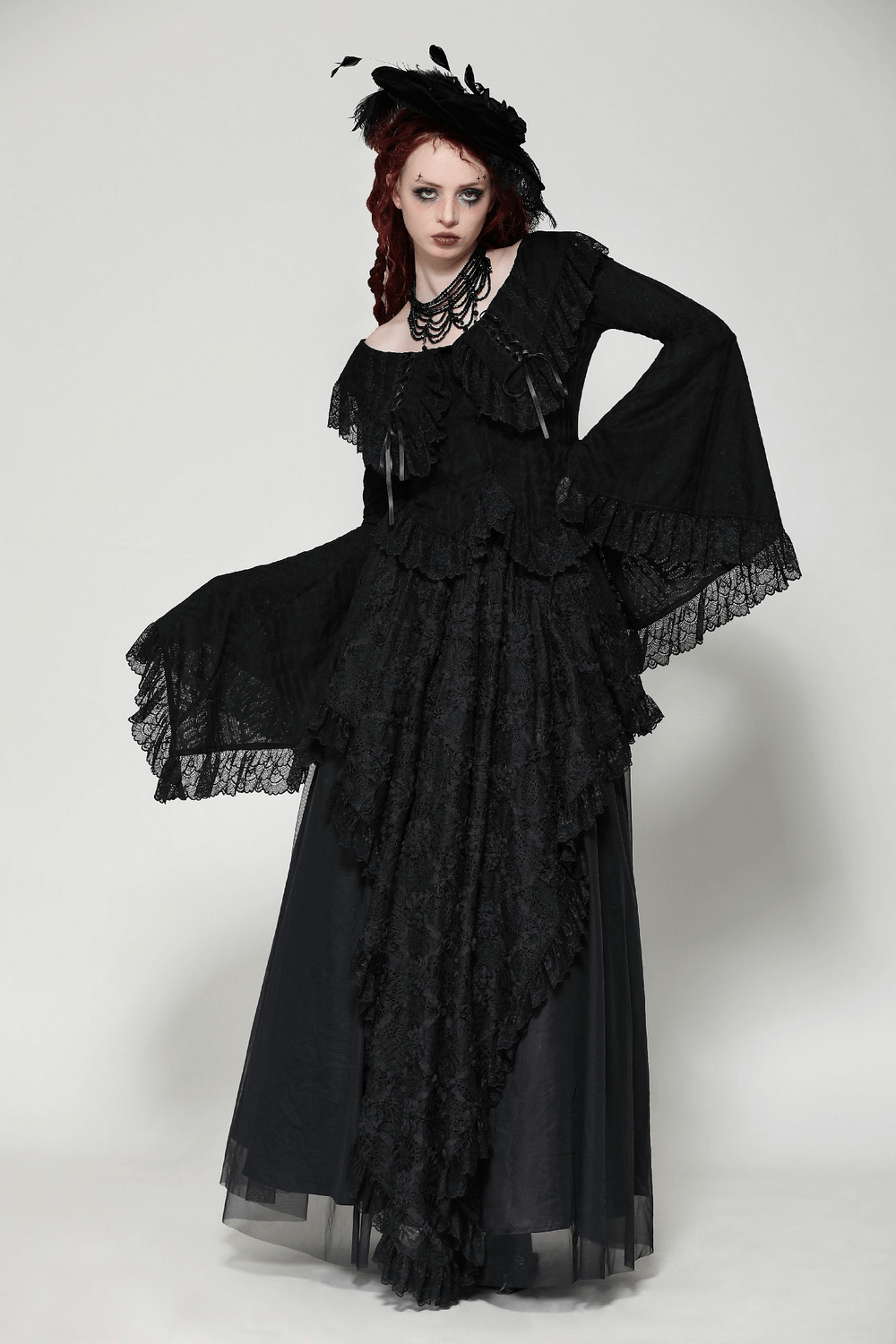 Stylish goth off-shoulder blouse with bell sleeves and ruffled lace for a dramatic gothic look. Perfect for dark elegance.