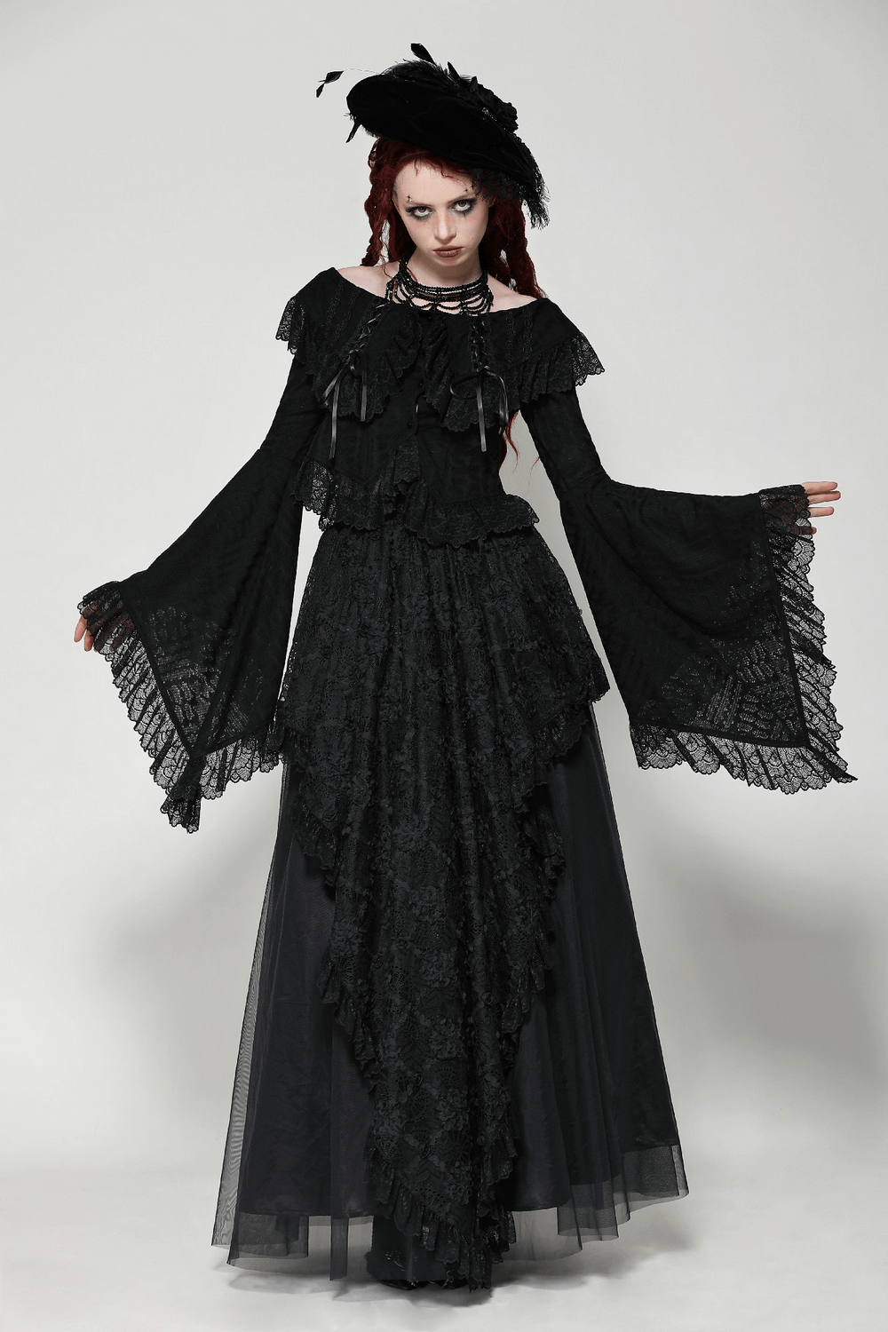 Stylish goth off-shoulder lace blouse with bell sleeves, featuring ruffles and a Victorian-inspired design.