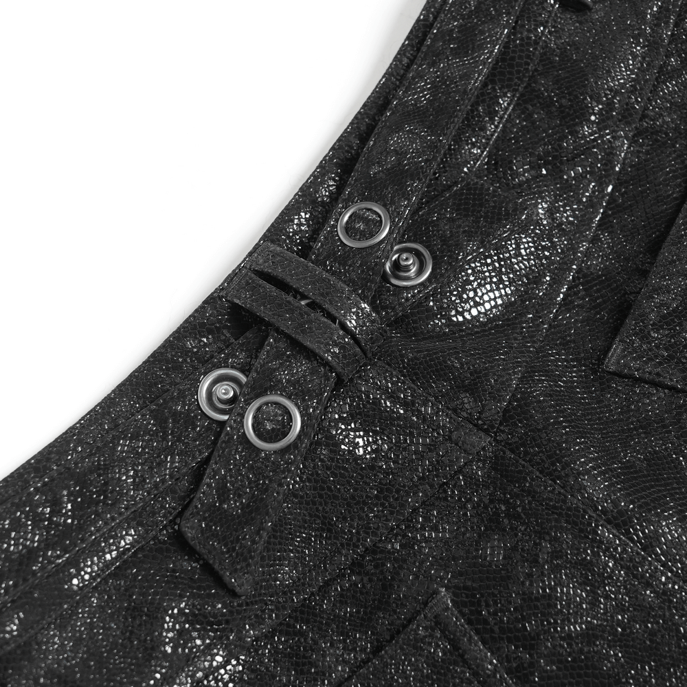 Close-up of stylish Gothic black faux leather shorts with button details and strappy accents, showcasing edgy texture.