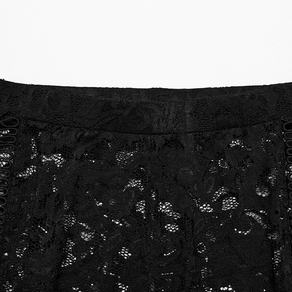 Close-up of stylish gothic black lace fabric for flare pants with intricate details and a delicate texture.