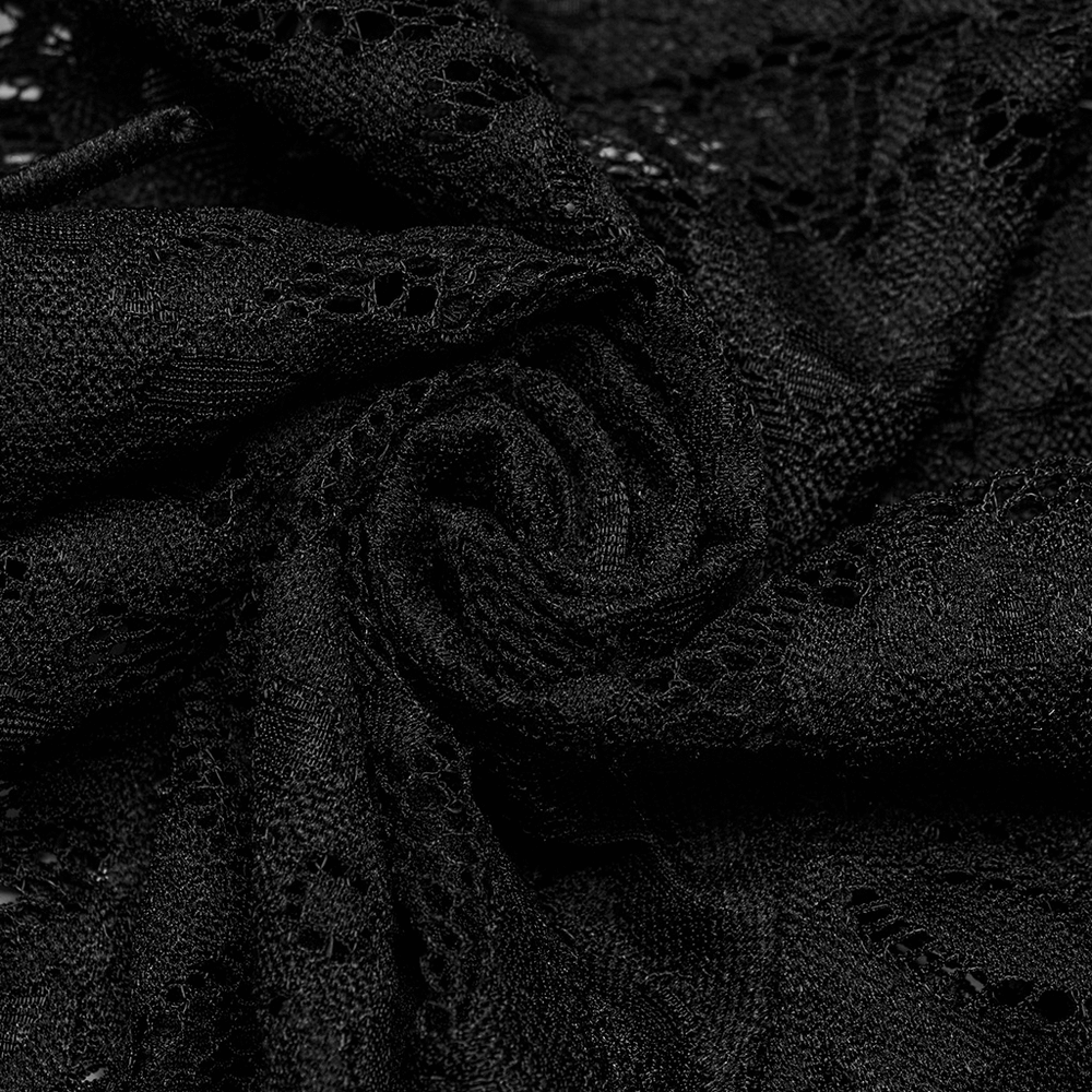 Close-up of black lace fabric, showcasing intricate patterns and textures perfect for gothic style fashion.