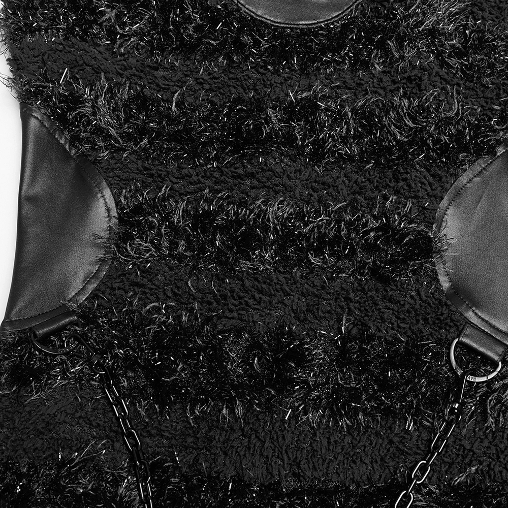 Close-up of a stylish gothic black mini dress featuring plush knit texture and chain detailing.