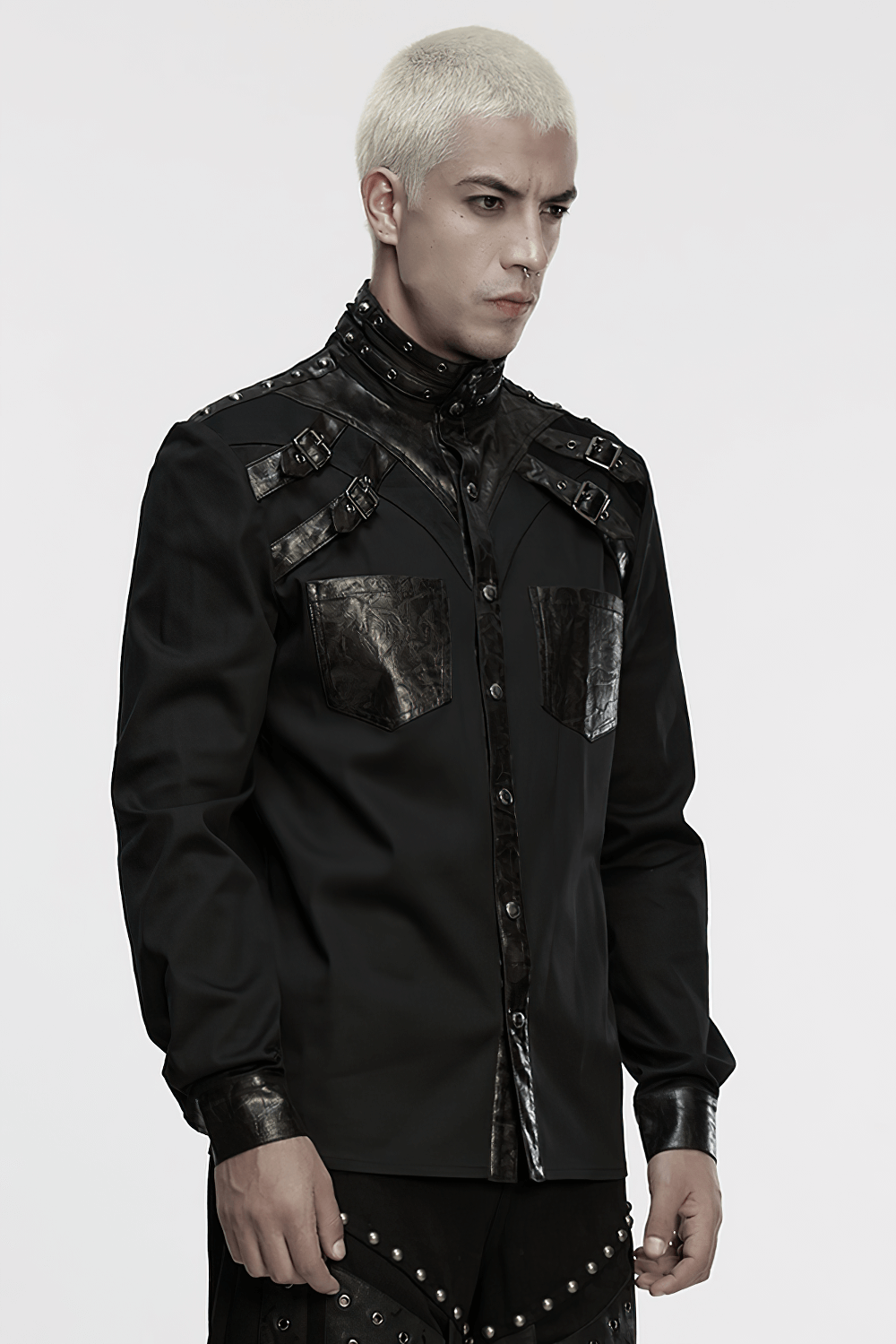 Stylish Gothic Buckled Faux Leather Patch Cyber Shirt worn by a model, featuring edgy design and buckled accents.