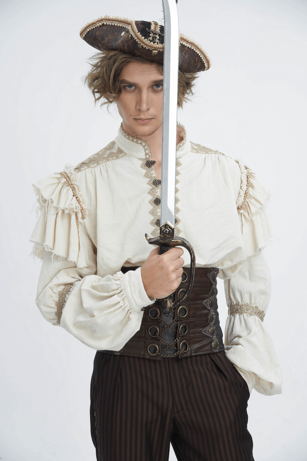 Model wearing a pirate-inspired outfit with a sword and stylish corset belt, embodying bold gothic fashion.