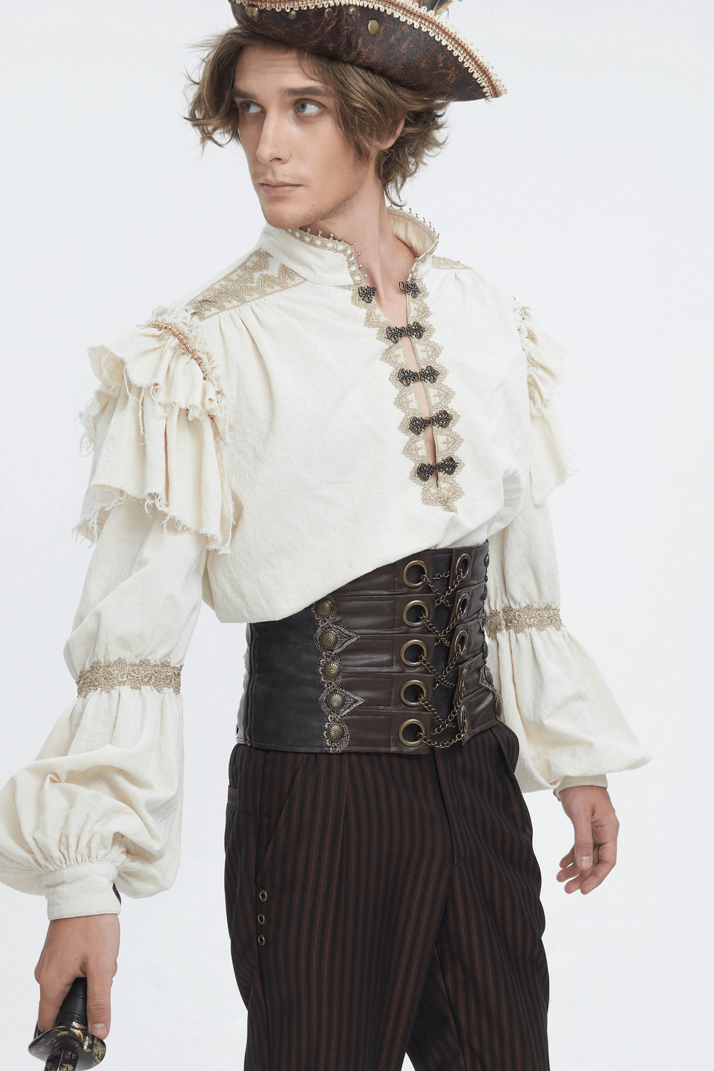 Model wearing a stylish pirate-inspired outfit with a vintage corset belt and ruffled shirt.