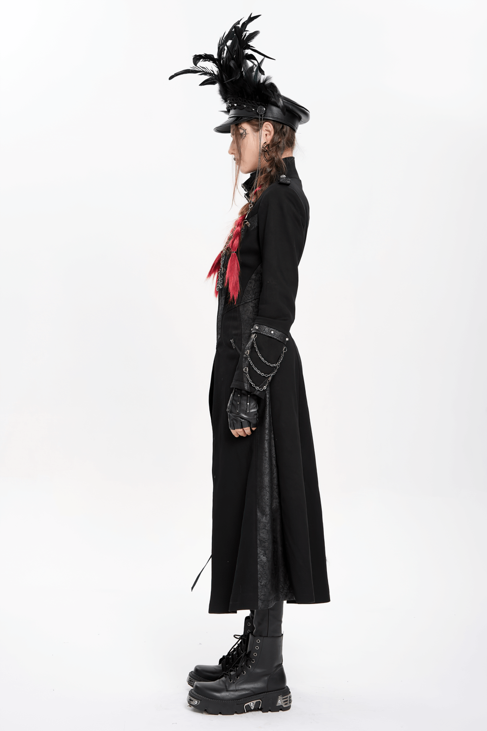 Side view of a stylish gothic long coat with chains, high collar, and dramatic length, complemented by edgy accessories.