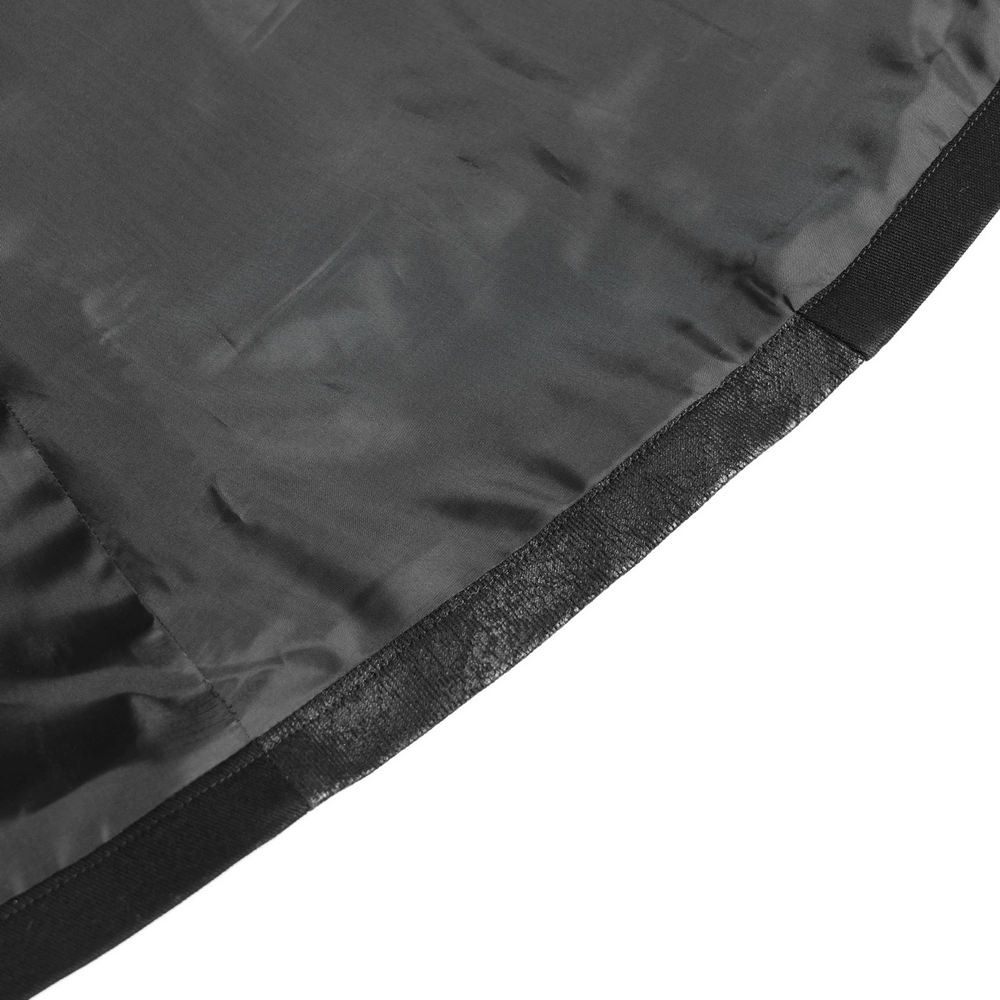 Close-up detail of the inner lining of a stylish gothic long coat in sleek black fabric.