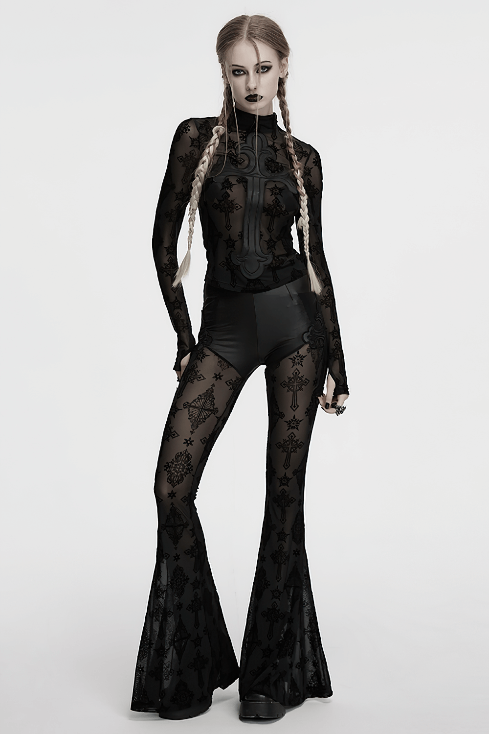 Stylish gothic mesh and faux leather flared pants with cross embroidery and layered design for a dark aesthetic.