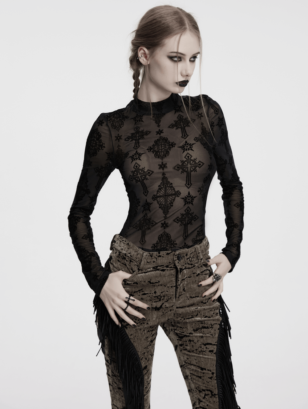 Stylish gothic mesh top with cross flocking details, paired with trendy fringed pants for a chic look.
