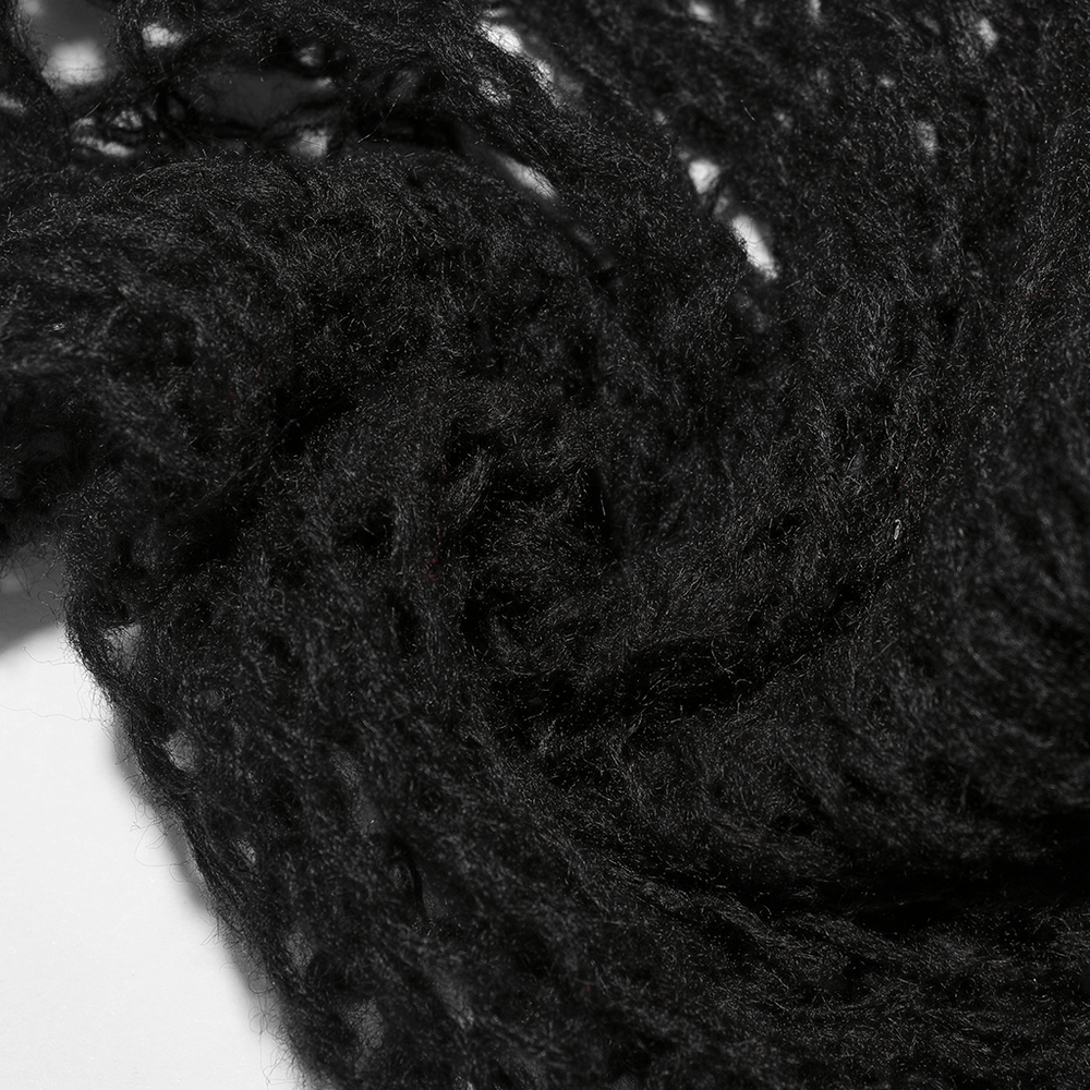 Close-up of soft black mohair knit, showcasing the intricate texture for stylish leg warmers.