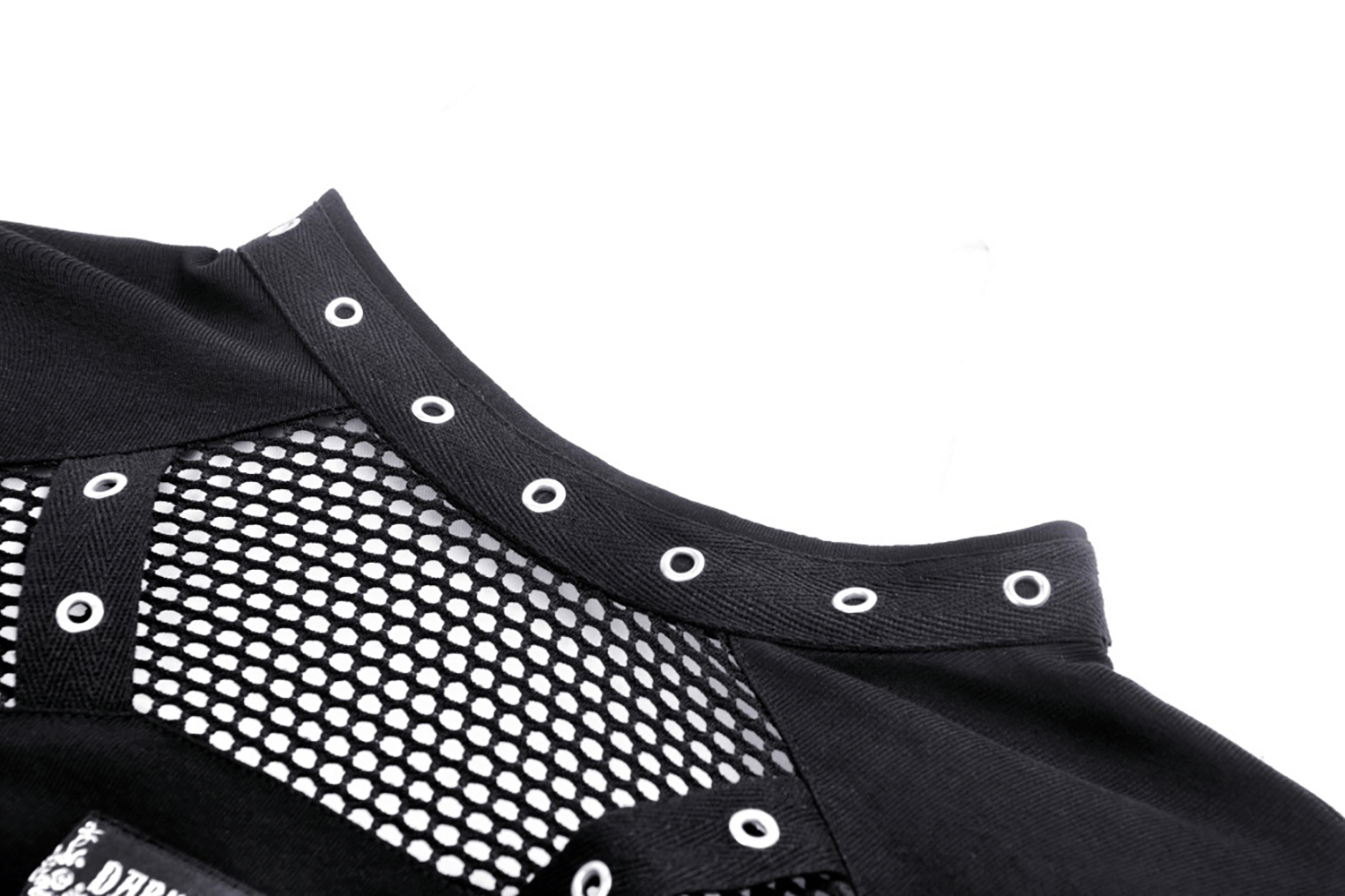 Close-up of black mesh crop top featuring cutout details and stylish eyelets for a chic gothic look.