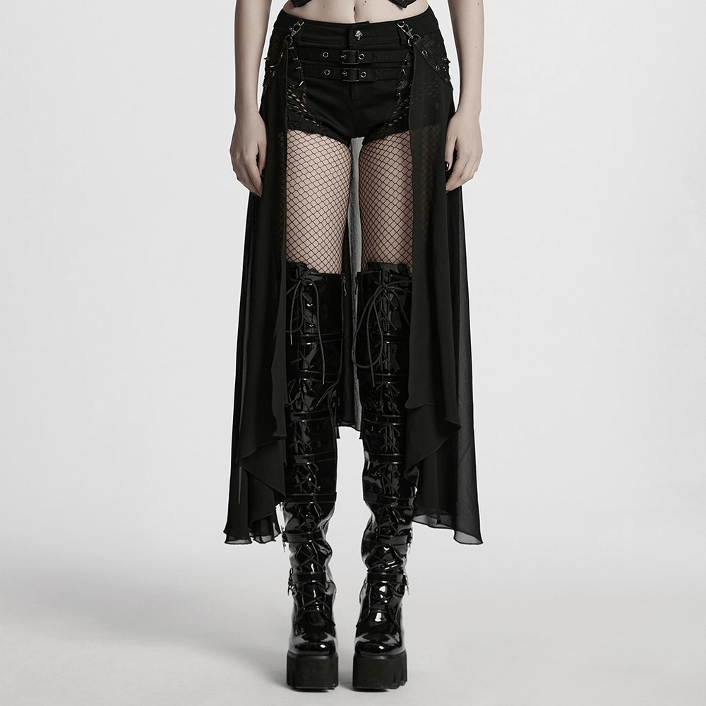 Stylish gothic shorts with detachable chiffon cape, paired with lace-up boots and fishnet stockings.