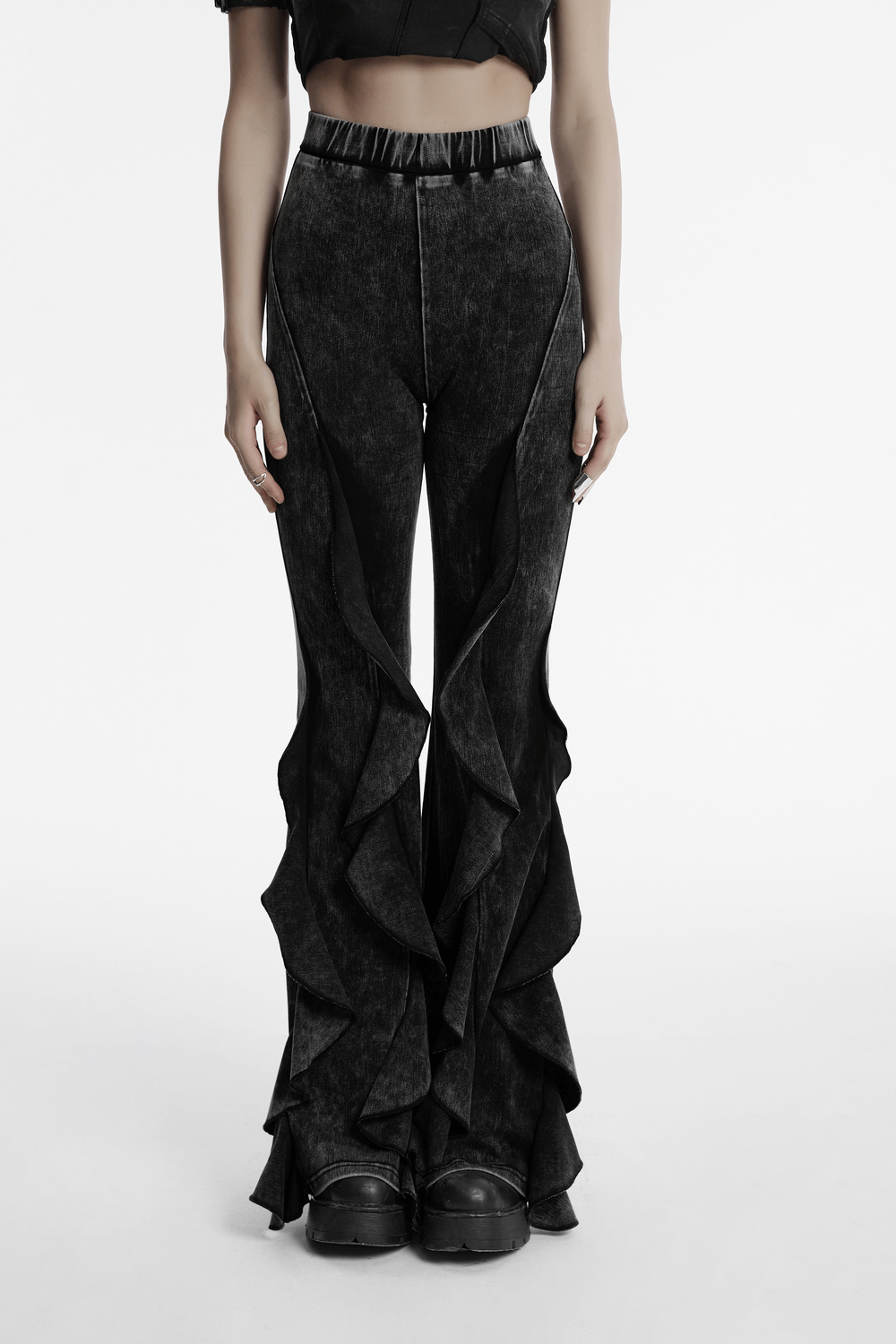 Stylish Gothic flared ruffled edge pants for women, featuring a dramatic fish-tail design and aged fabric look.