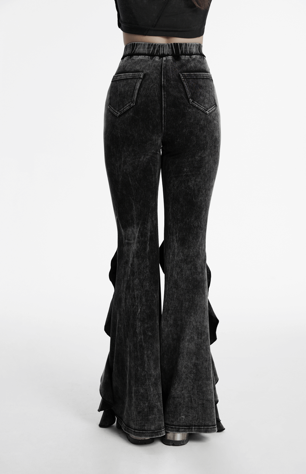 Back view of stylish Gothic washed flared pants for women with ruffled edges, offering a vintage-inspired look.