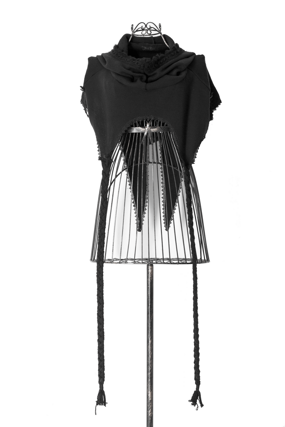 Stylish black hooded wool cape on a mannequin, embodying gothic punk rave fashion.