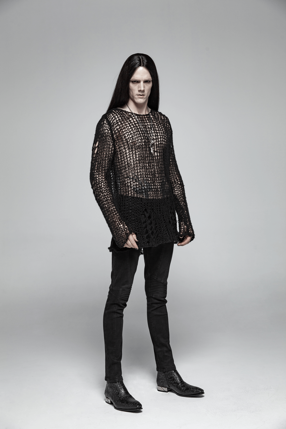 Stylish knit mesh pullover sweater worn by a model, showcasing a trendy and breathable chic design.
