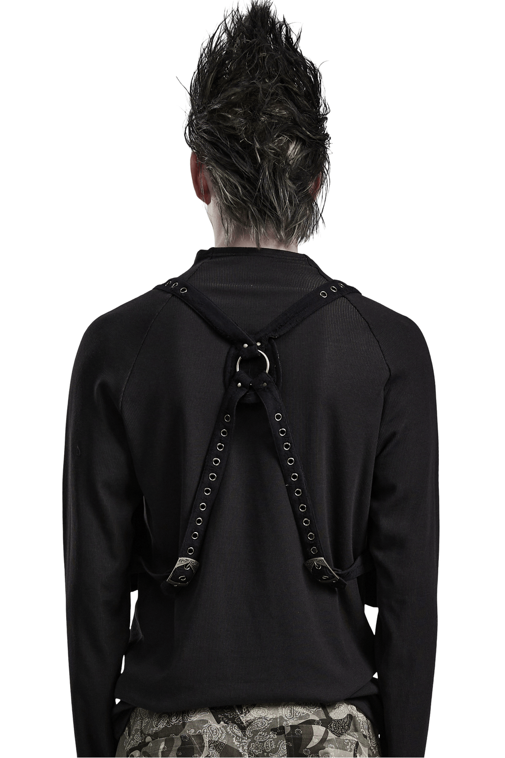 Back view of a person wearing a stylish knitted and leather harness with adjustable straps.