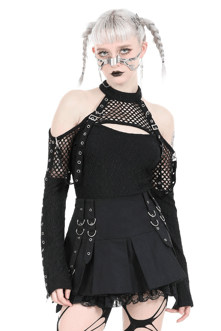 Edgy black lace top with cutouts and lace-up sleeves paired with a stylish black skirt, ideal for a rockstar look.