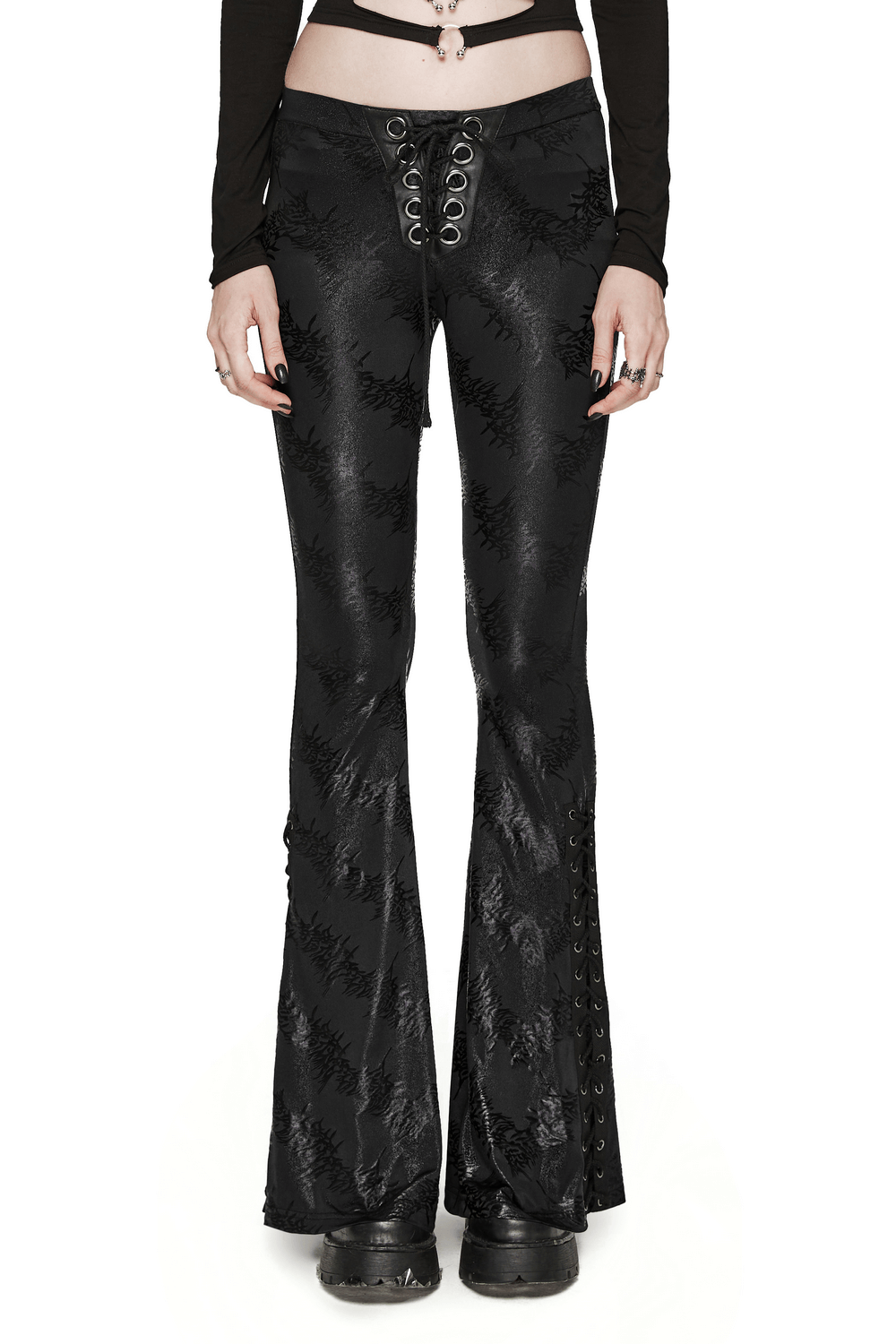 Edgy black lace-up flared pants with sparkling tree texture and drawstring details, perfect for a punk-inspired look.