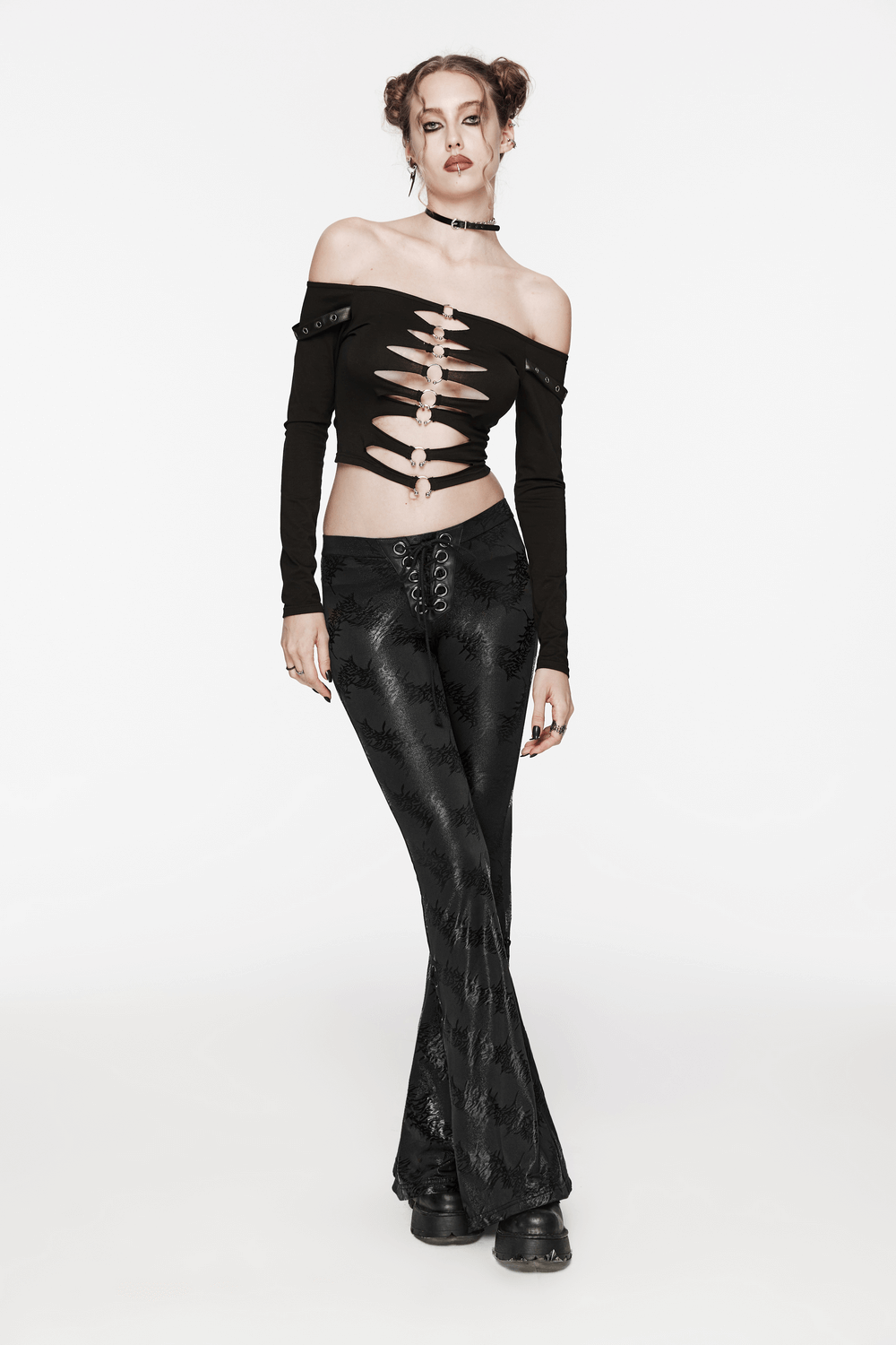 Stylish black lace-up flared pants with sparkling tree texture, perfect for edgy, punk-inspired fashion.
