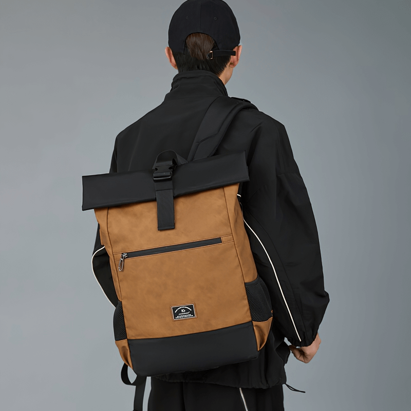 Stylish brown large capacity laptop backpack in urban setting, showcasing both functionality and casual style.
