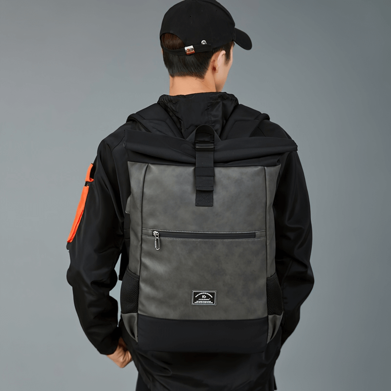 Stylish large capacity laptop backpack worn by a man, showcasing its luxury soft design and modern look.