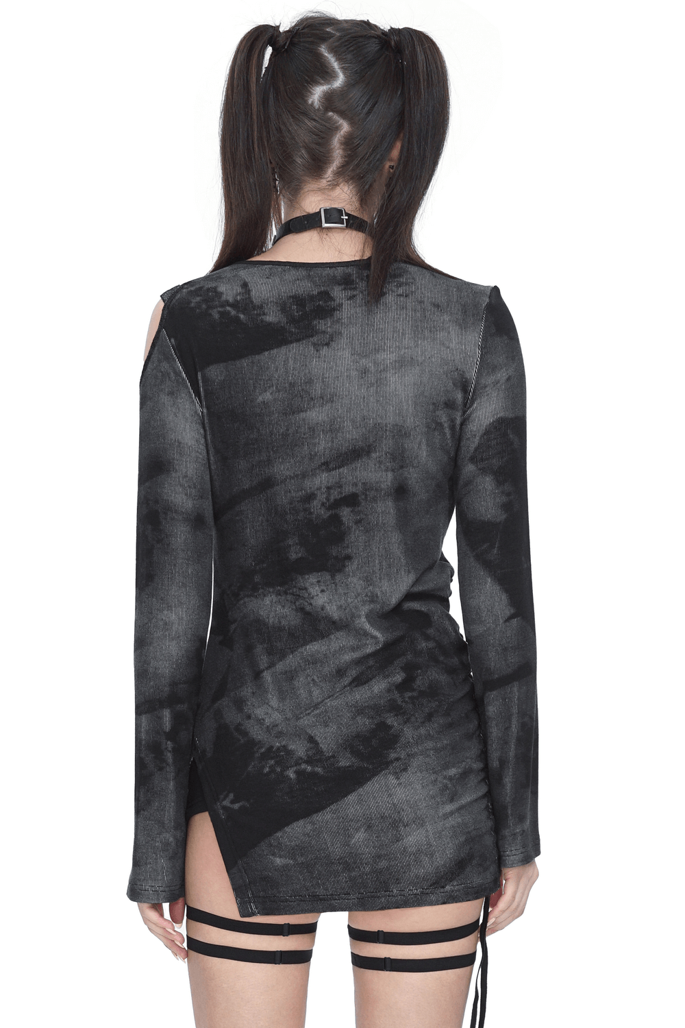 Back view of stylish long sleeve asymmetric top with buckle detail and edgy design.