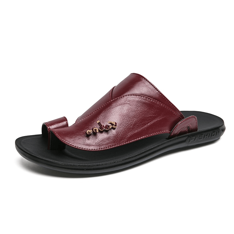 Stylish burgundy PU leather slippers for men, perfect for casual and luxury wear.