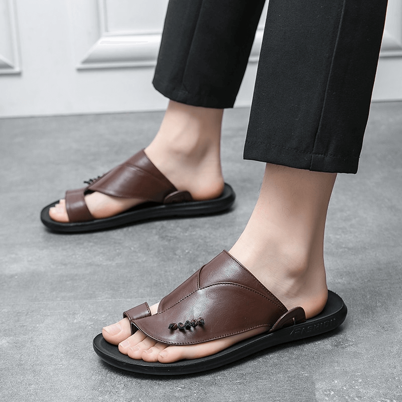 Stylish male PU leather slippers in brown, showcasing modern casual fashion and comfort for relaxed moments.