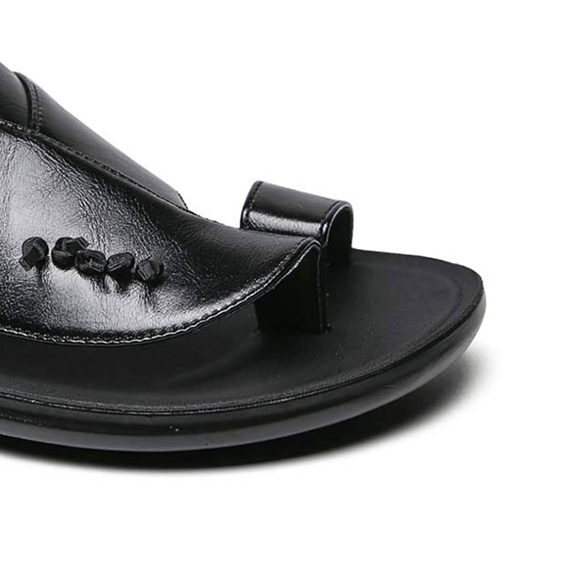 Close-up of stylish male PU leather slippers featuring modern design and chic details for men.