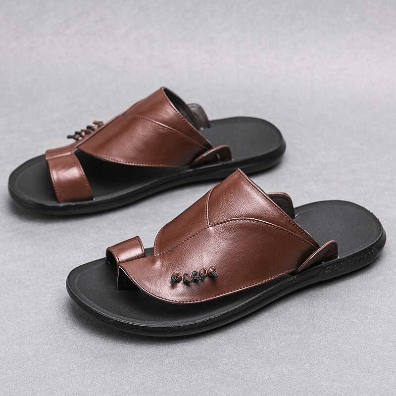 Stylish brown PU leather slippers for men, perfect for casual elegance and everyday comfort.