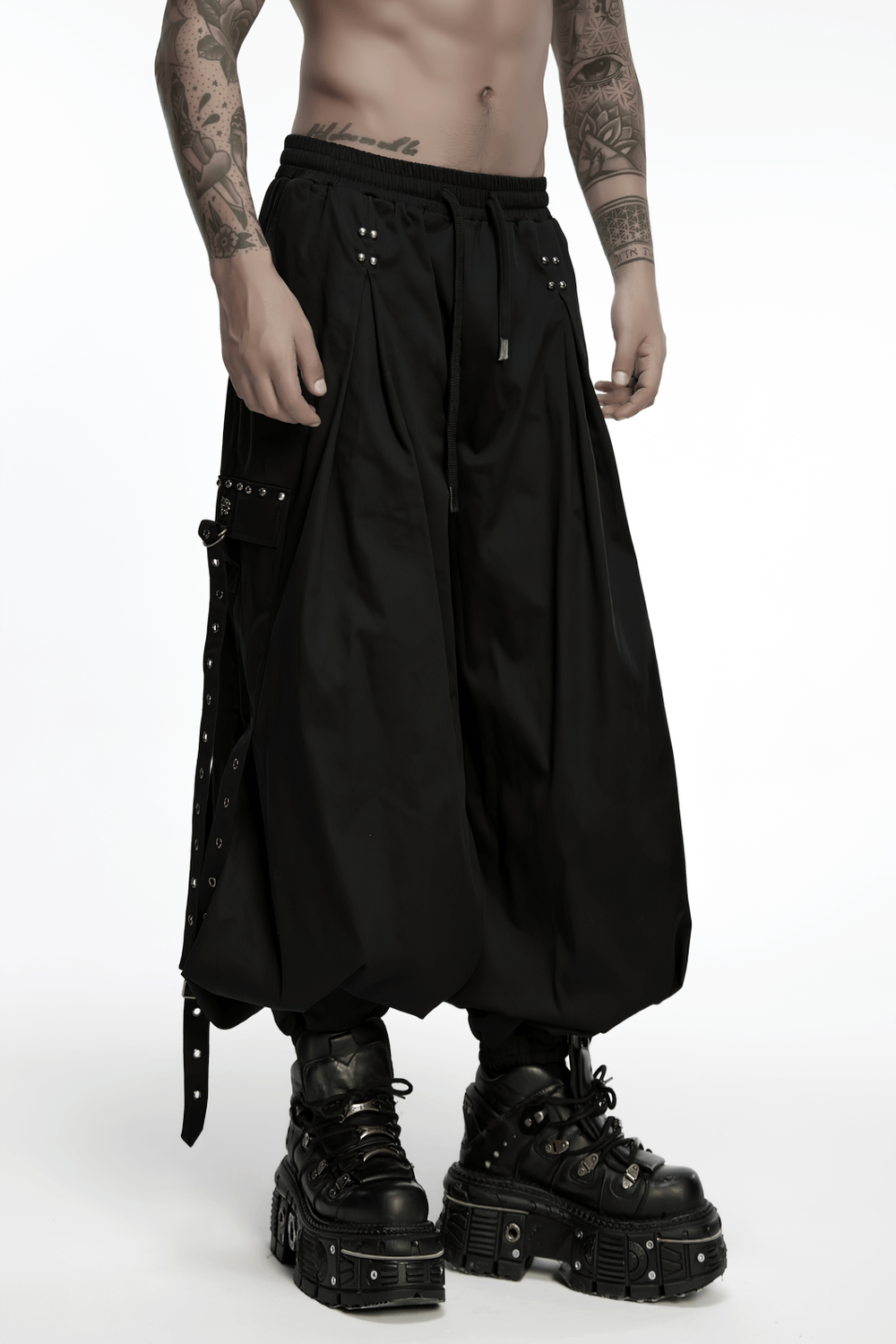 Stylish Men's Cyberpunk Loose Cargo Pants with Straps, featuring a black cuffed silhouette and bold straps.