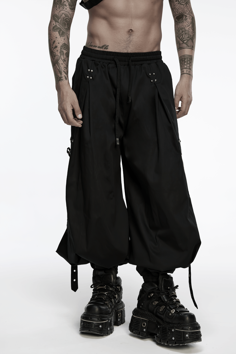 Stylish Men's Cyberpunk Loose Cargo Pants with Straps worn by a male model showcasing streetwear style.