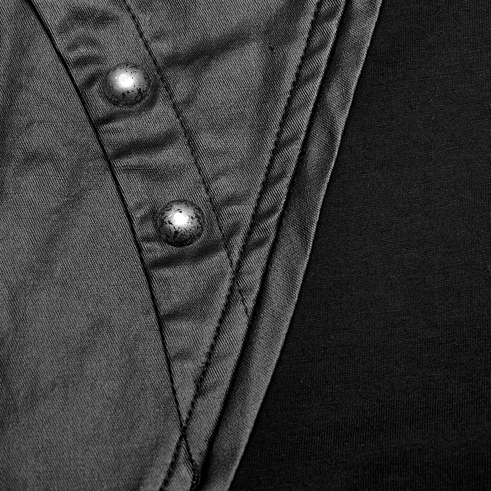 Close-up of a stylish gothic top featuring metal rivets and a unique collar design.