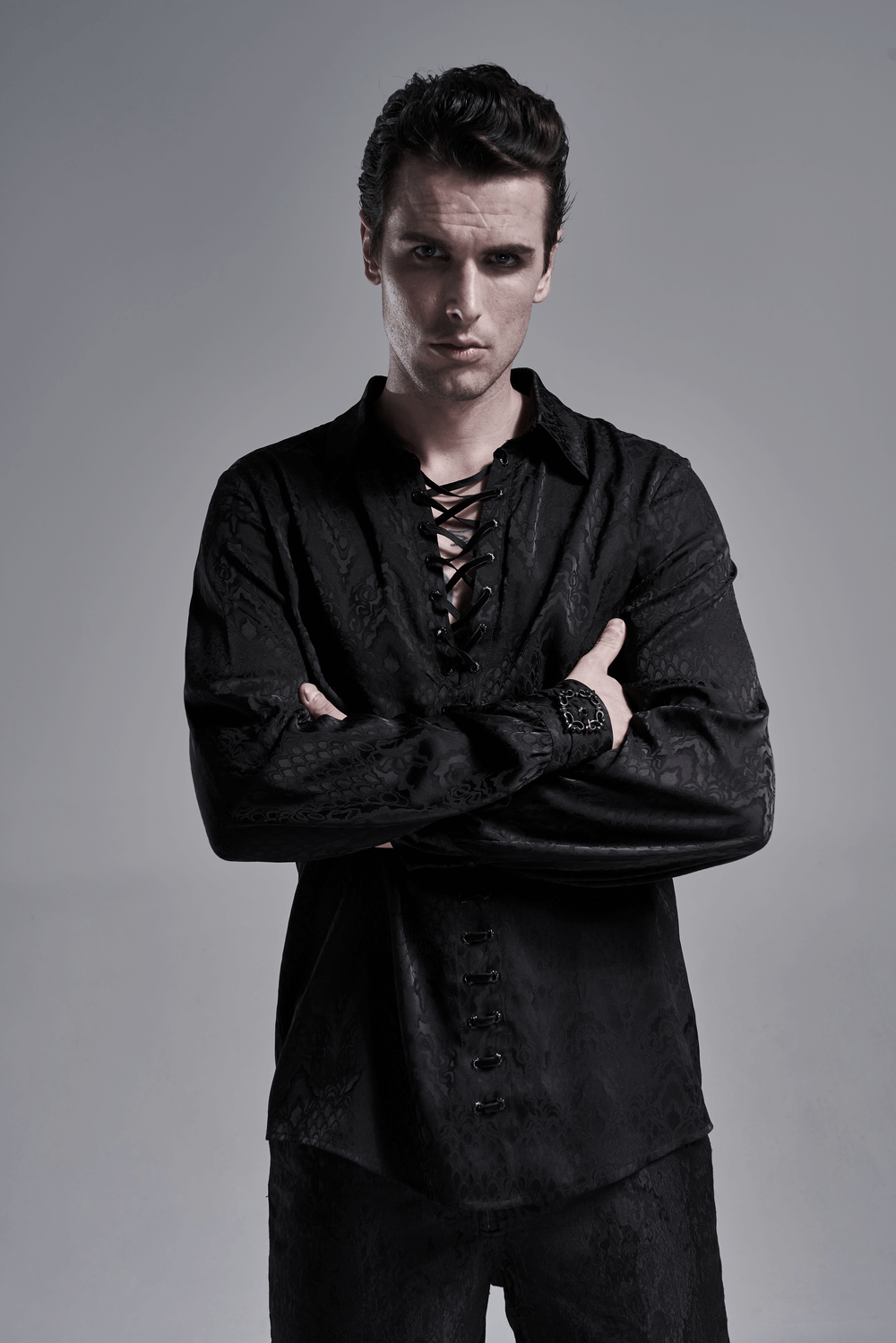 Stylish men's black lace-up gothic jacquard shirt featuring corset lacing and long sleeves, exuding vintage elegance.