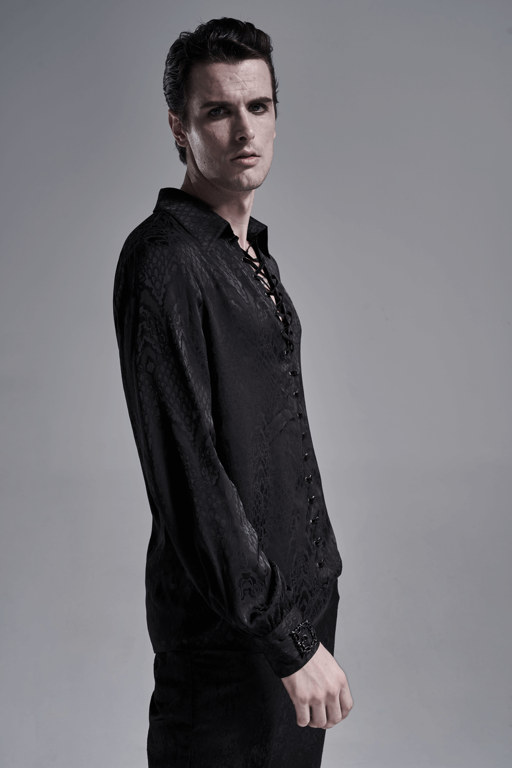 Stylish black men's lace-up gothic jacquard shirt with elegant details and adjustable design.