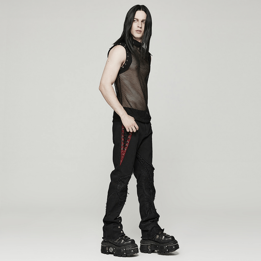 Stylish men's punk mesh top featuring denim inserts, paired with edgy black pants and oversized shoes.