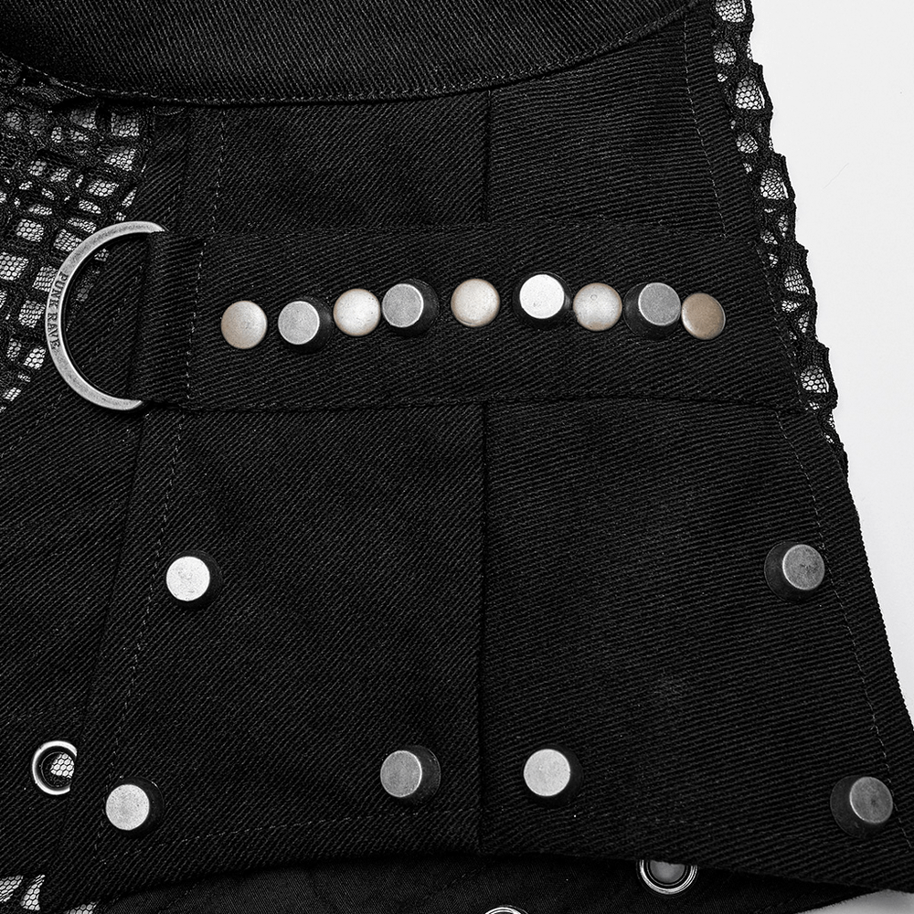 Close-up of stylish men's punk mesh top showcasing unique denim inserts and edgy metallic details.