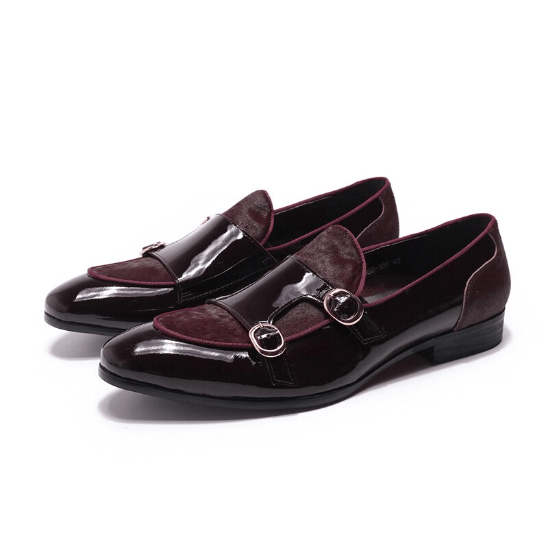 Stylish men's patent leather loafers in burgundy with double buckle, perfect for casual and sophisticated looks.
