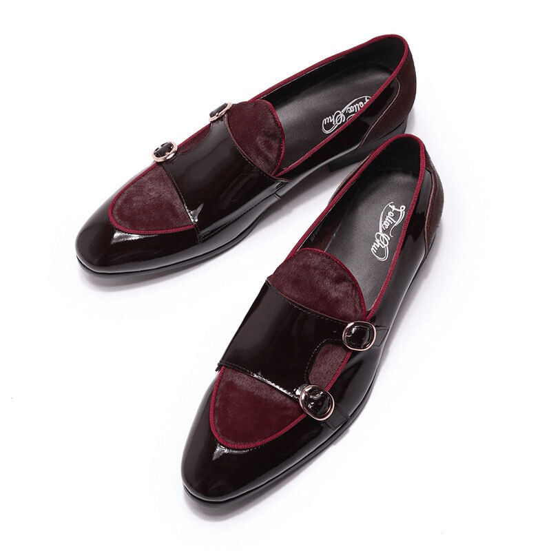 Stylish men's patent leather loafers with double buckles in sleek burgundy and black finish.