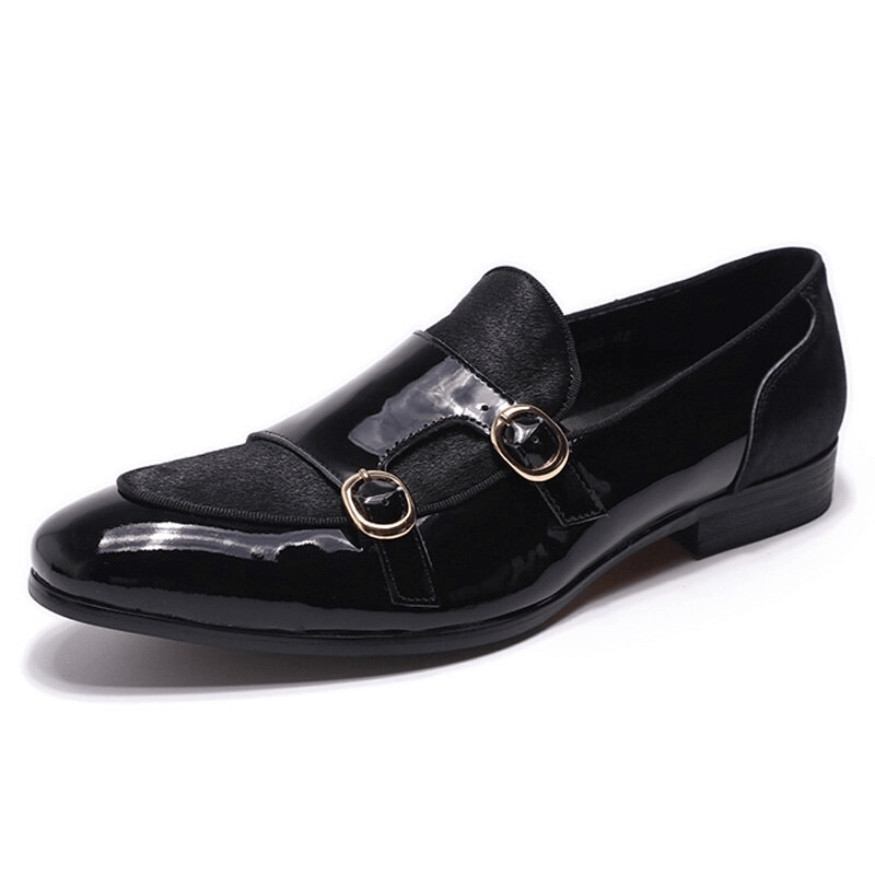 Stylish men's patent leather loafers featuring a sleek design and double buckle accents for casual sophistication.