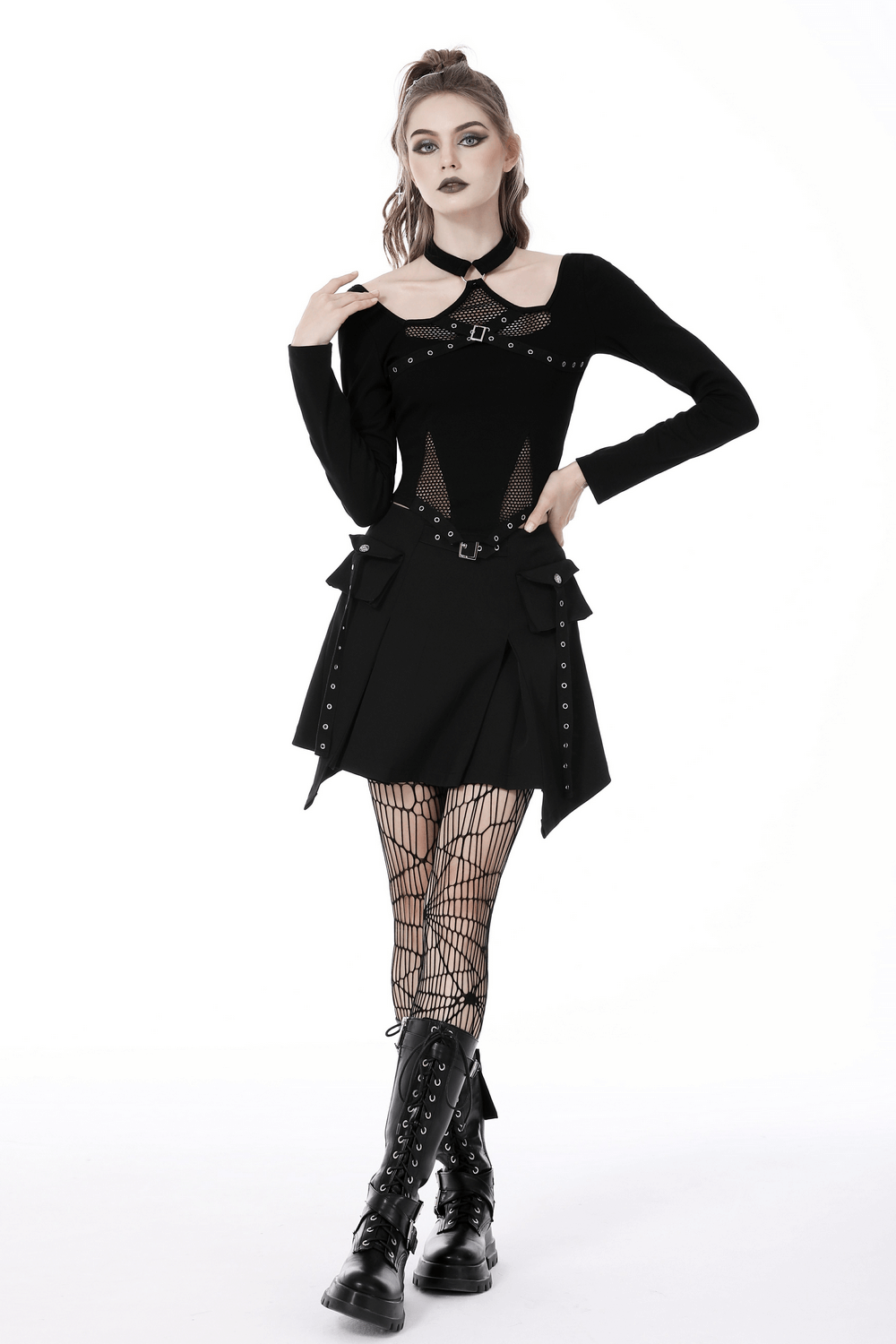 Gothic mesh crop top with choker, long sleeves, and punk rock style paired with a black skirt and fishnet tights.