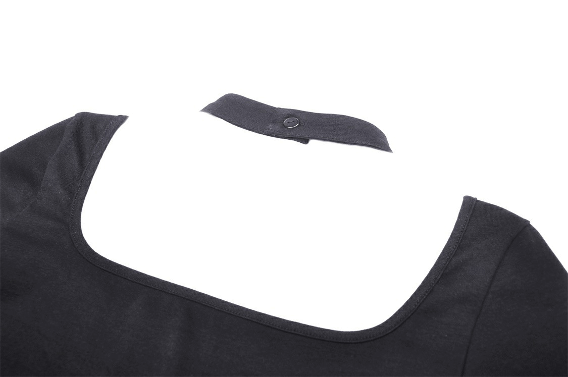 Close-up of the stylish black mesh crop top with halter neck and button detail at the back.