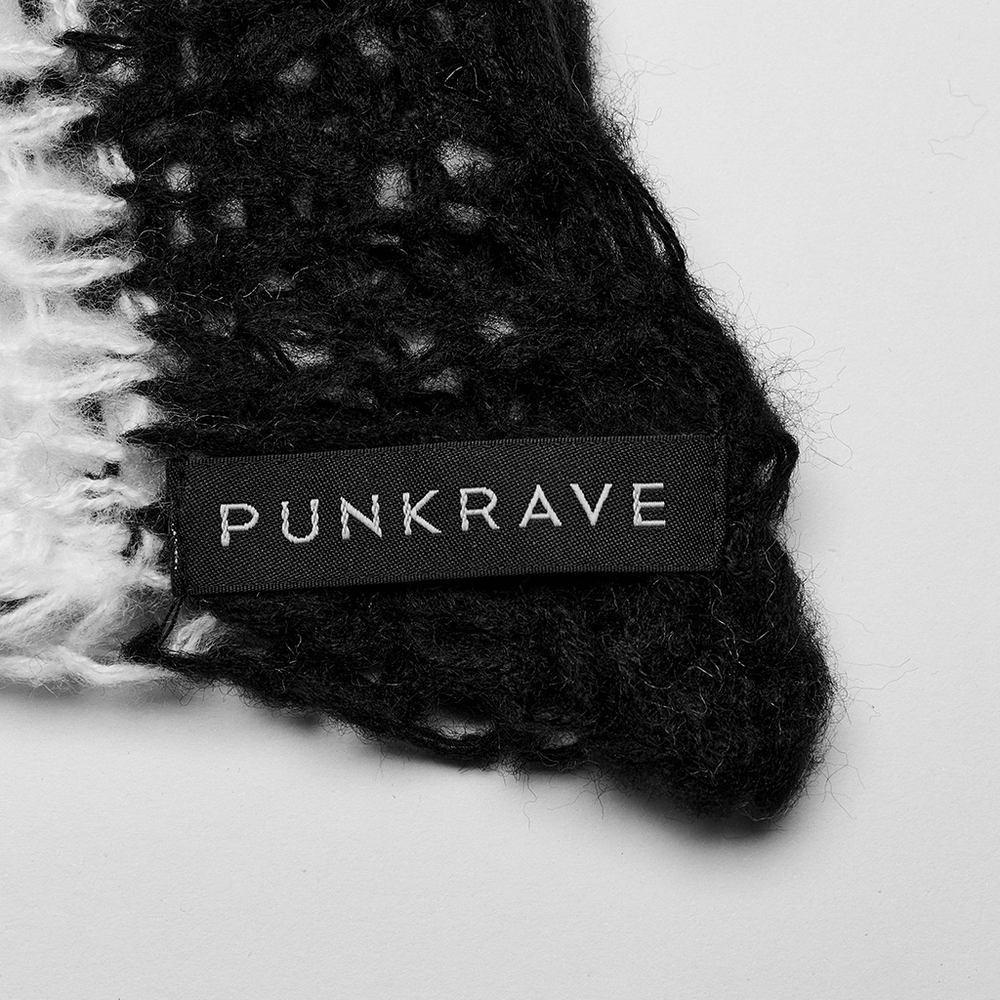 Close-up of the PUNK RAVE label on a stylish mohair pullover showcasing its edgy design and punk aesthetic.