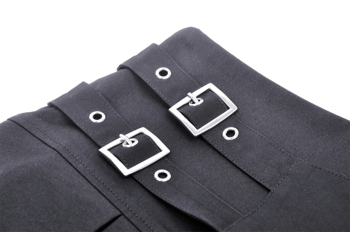 Close-up of stylish black mini skirt showing edgy buckle detail for a punk rock look.