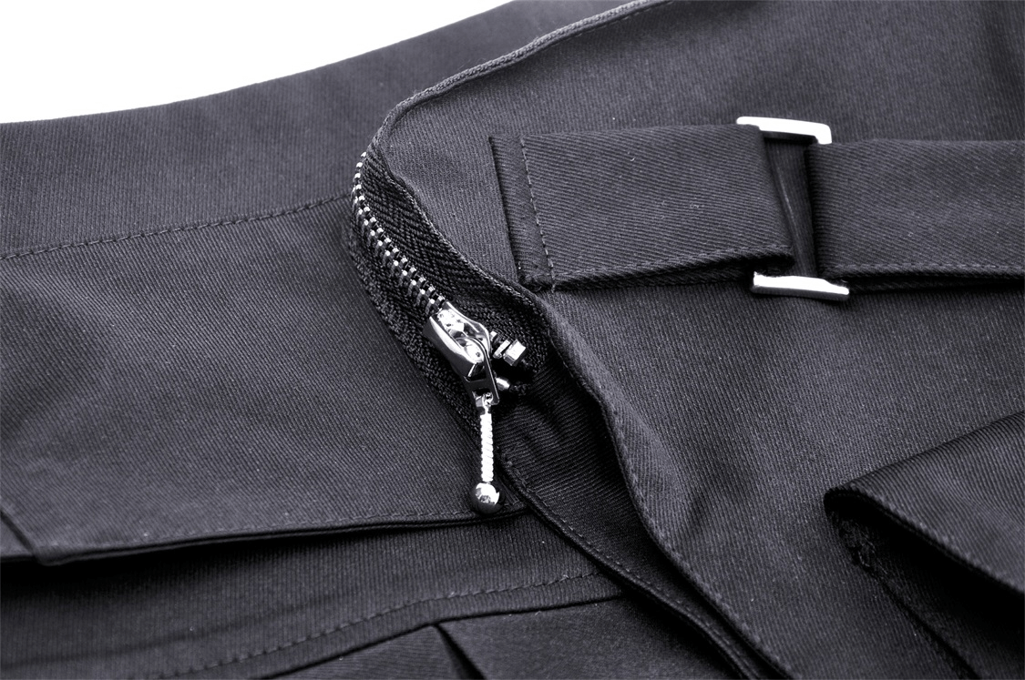 Close-up of black mini skirt zipper and punk buckle detail for stylish, edgy fashion.