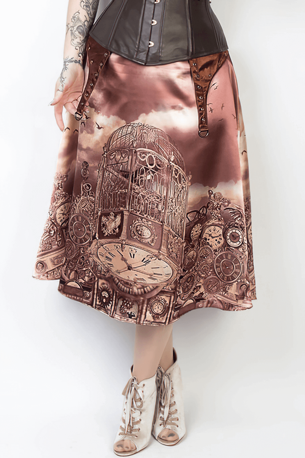 Vintage-inspired satin A-line skirt with clockwork and birdcage prints, perfect for steampunk fashion.