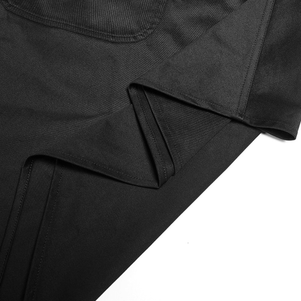 Close-up of stylish black asymmetrical cargo mini skirt showcasing fabric texture and adjustable belt.