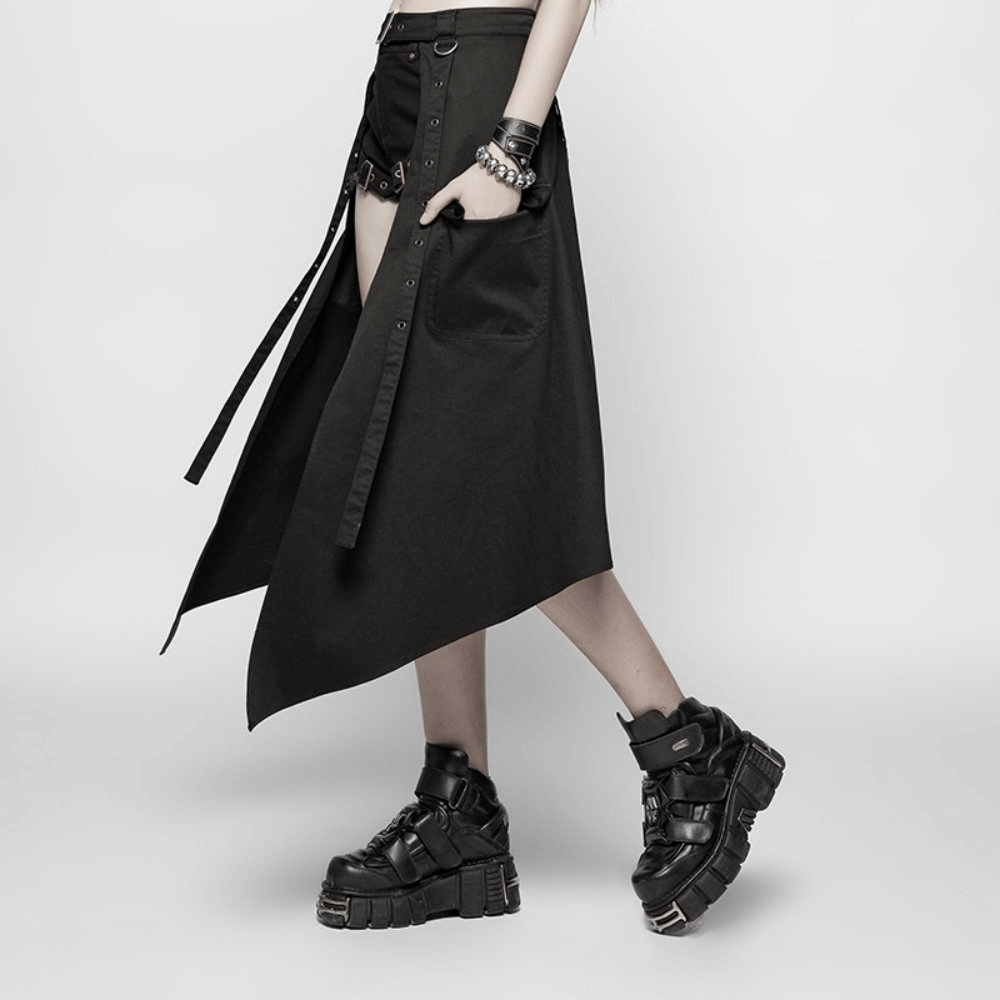 Stylish punk black asymmetrical cargo mini skirt with utility pockets and edgy footwear.