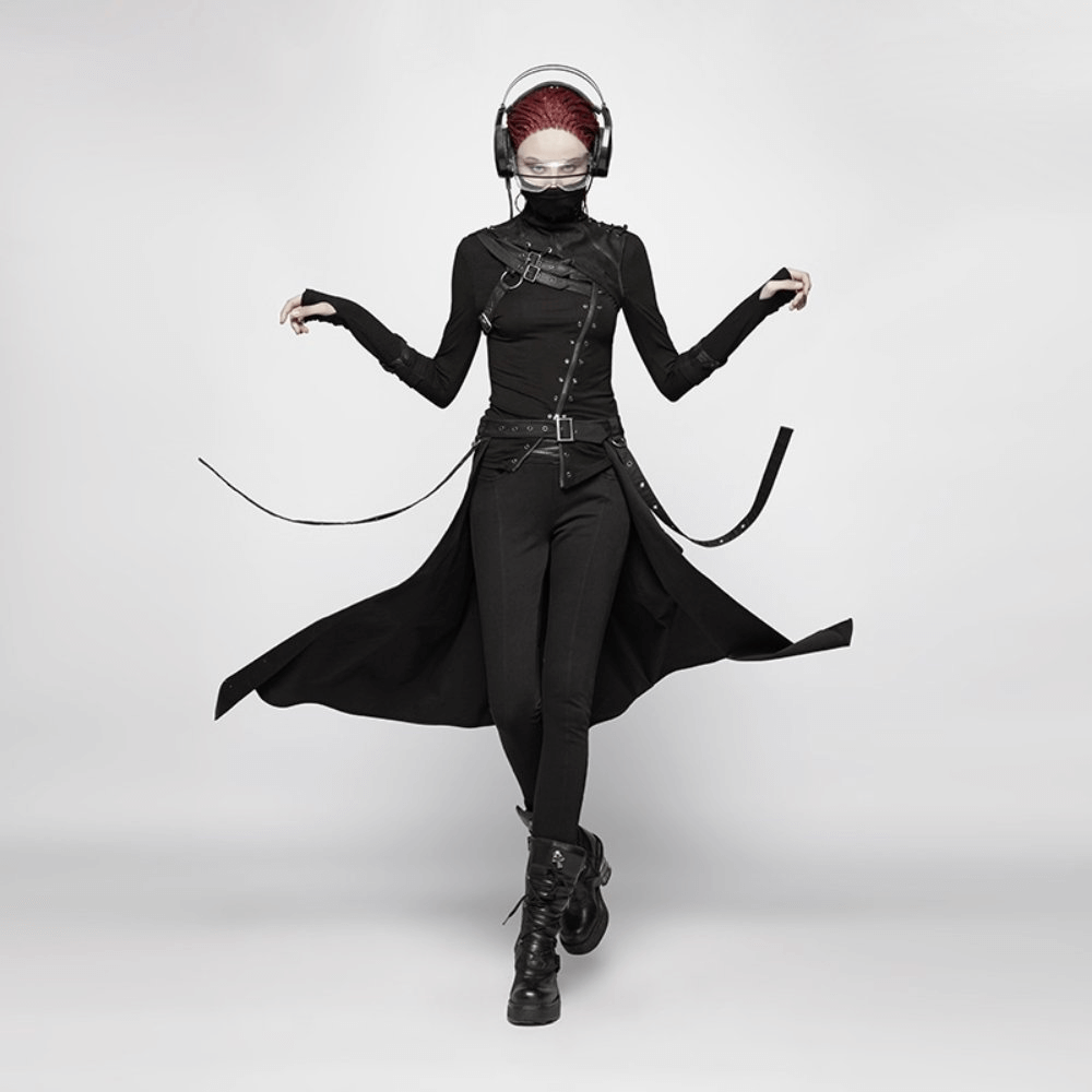Edgy model in black fashion outfit with headphones, showcasing punk style with unique details and accessories.